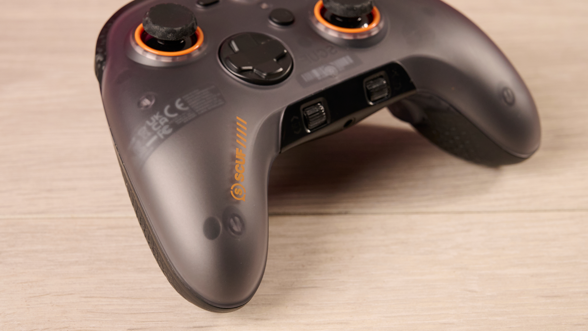 A closeup of the front of the left grip of the Scuf Valor Wired with TMR.