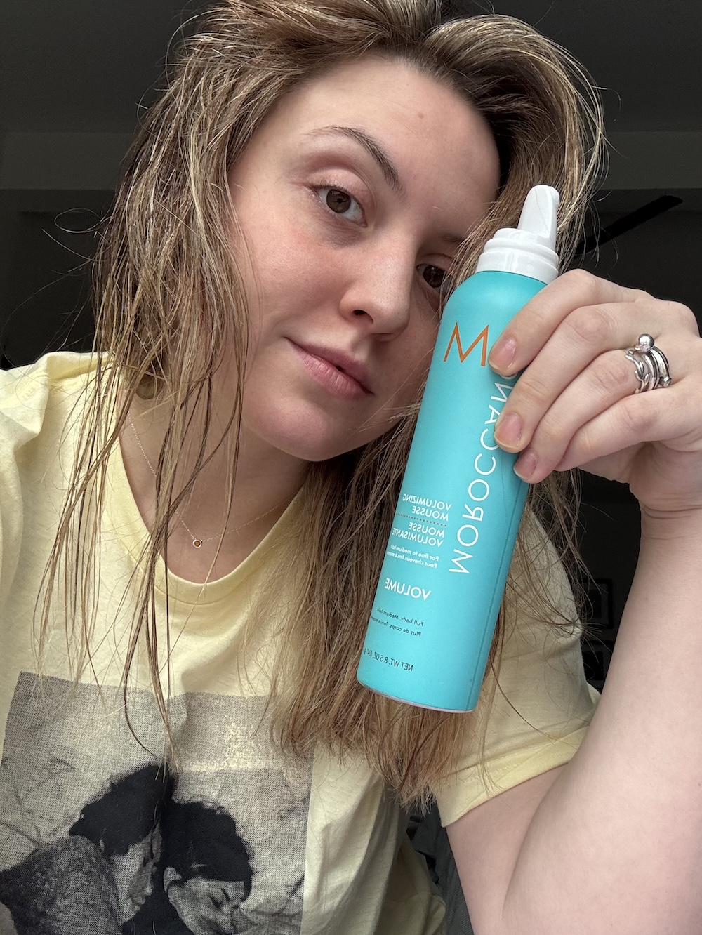 Sophia Vilensky with a bottle of Moroccanoil Mousse.