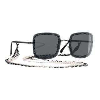 Pair of black Chanel sunglasses with attached chain
