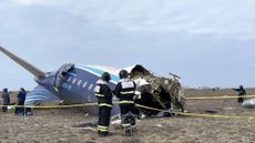 A view of the crash site where an Azerbaijan Airlines flight with 67 people on board, traveling from the Azerbaijani capital Baku to Grozny in Russia's Chechnya region, crashed near the Kazakh Caspian city of Aktau