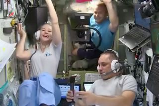 Actress Yulia Peresild and producer Klim Shipenko, together with cosmonaut Anton Shkaplerov, film scenes for "Вызов" ("Challenge" in English) on the International Space Station.