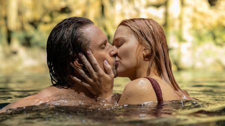 Mel and Jack kiss in the water