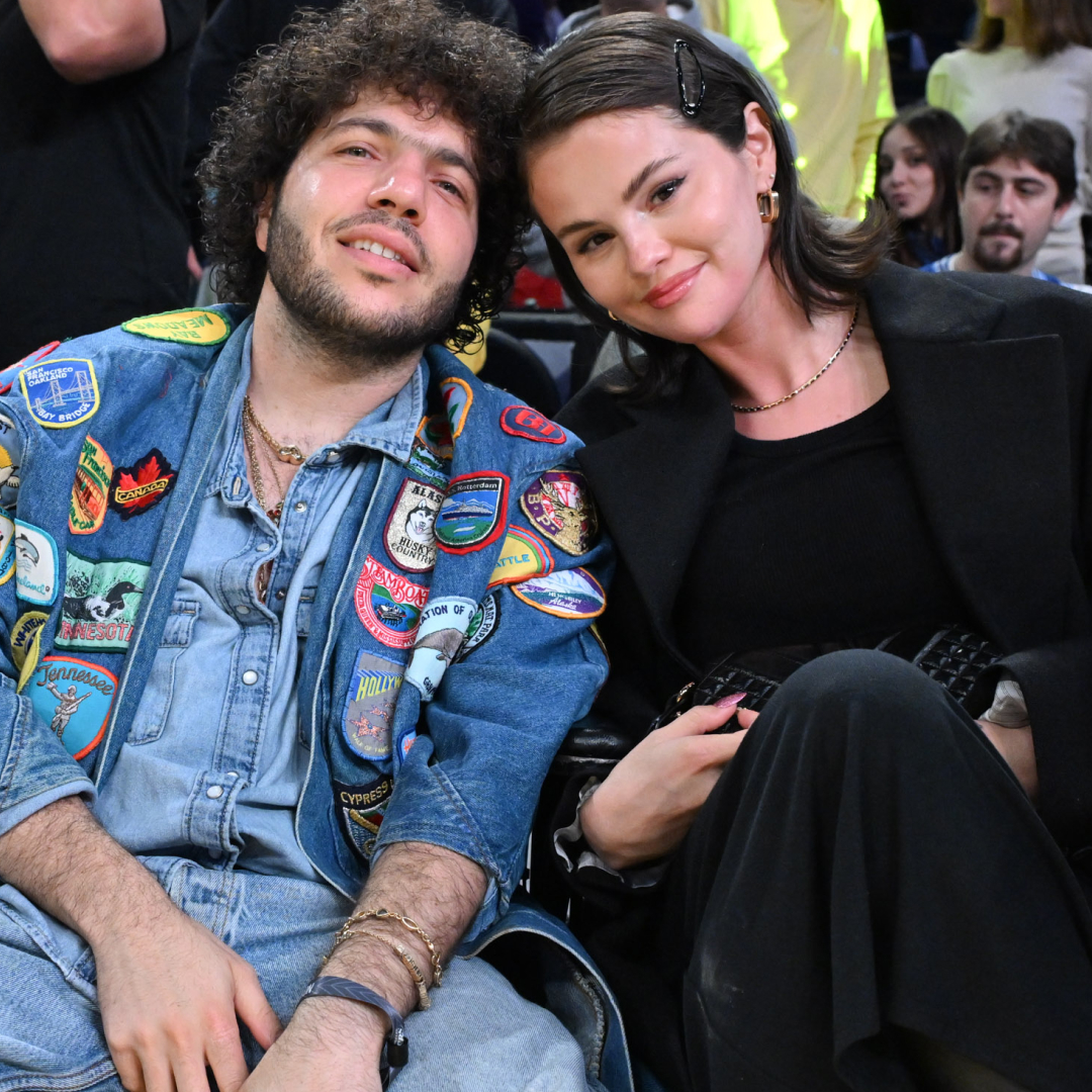 Selena Gomez and Benny Blanco attended a L.A. Lakers game—Selena wore all-black, plus a Versace handbag and knee-high boots
