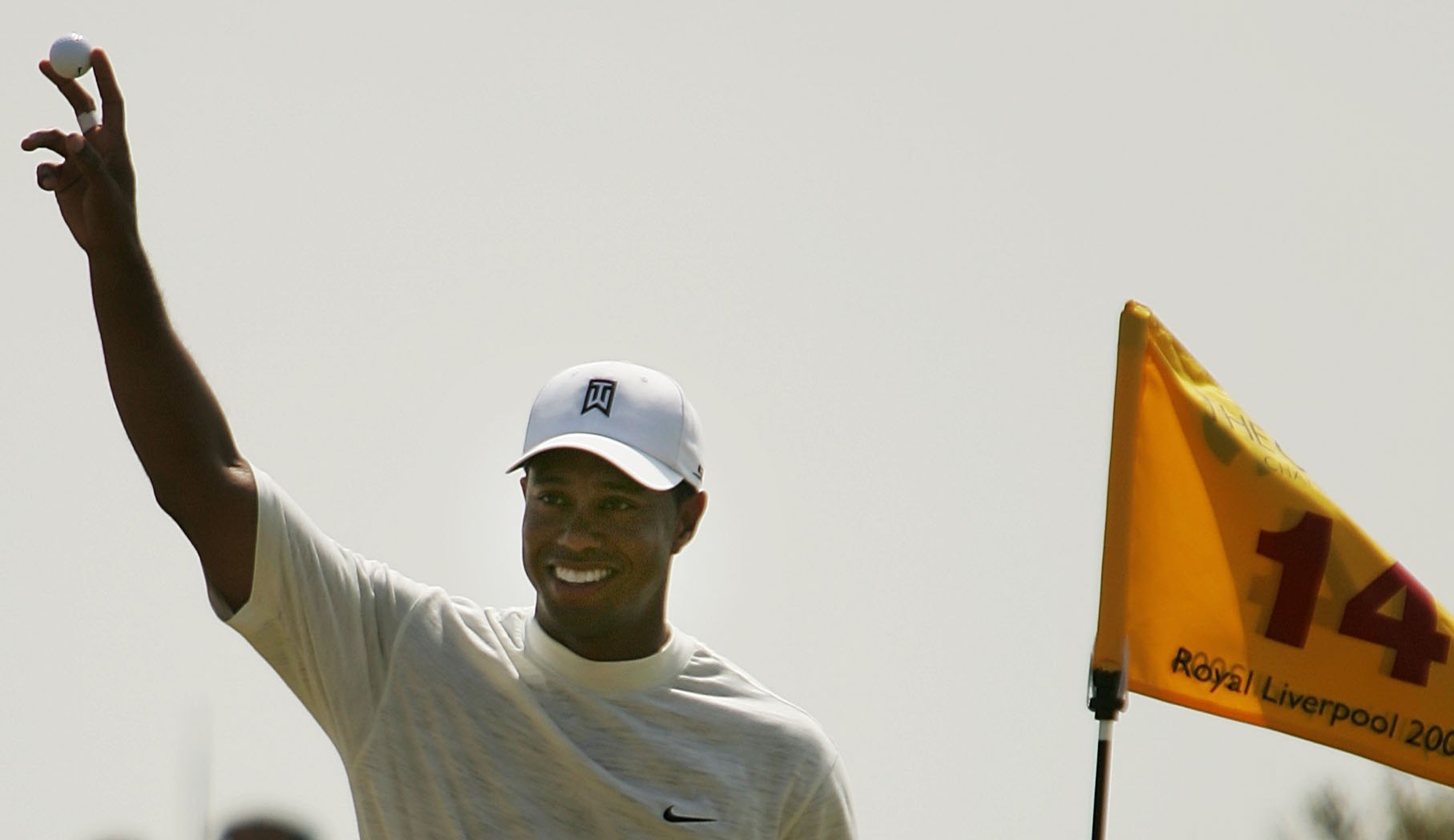 Tiger Woods waves to the crowd