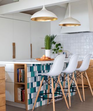 Kitchen island tiled with multicolors
