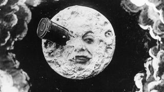 Old movie still image of moon man with rocket in the eye