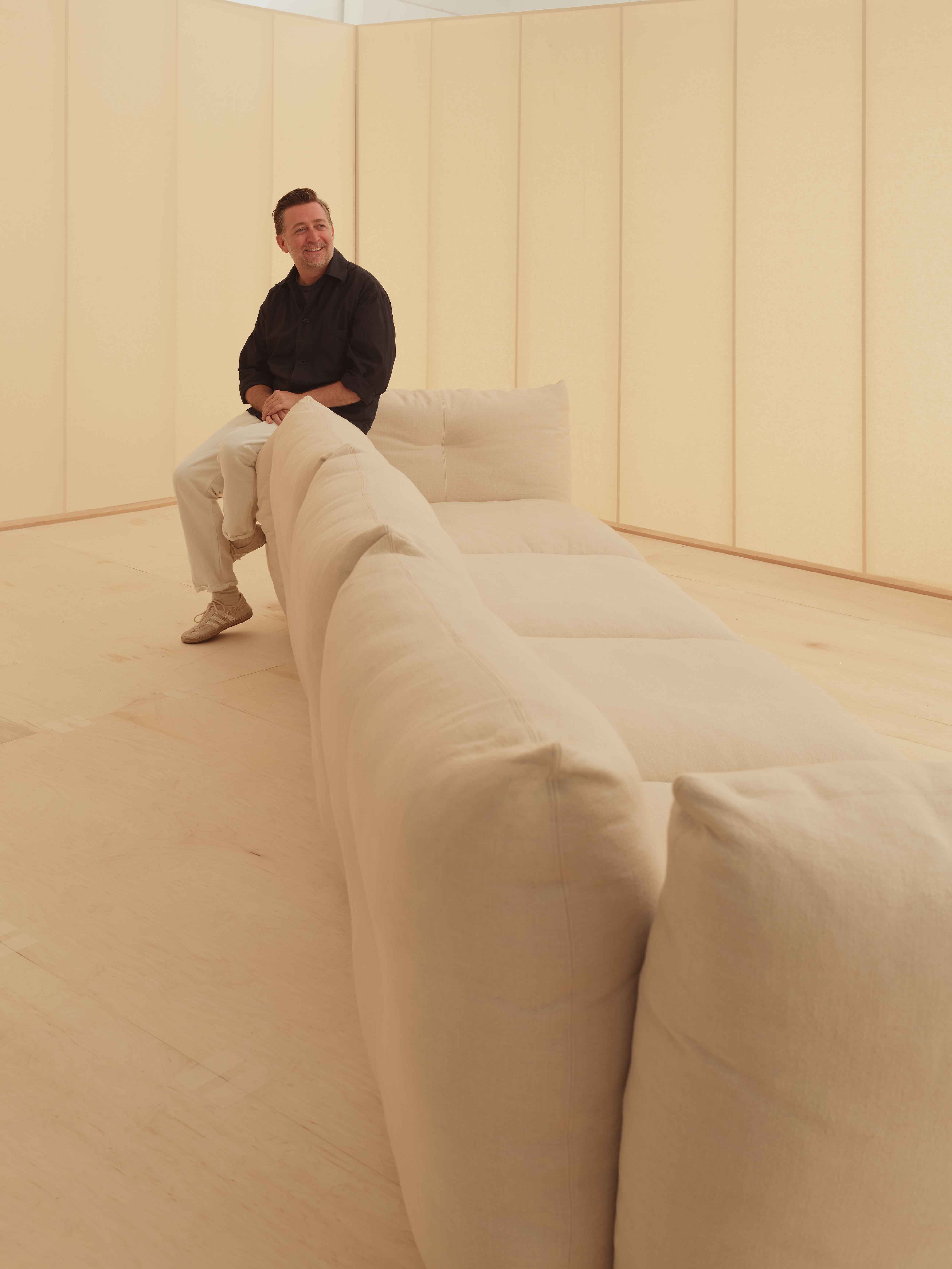 Willo Perron on white sofa from Knoll