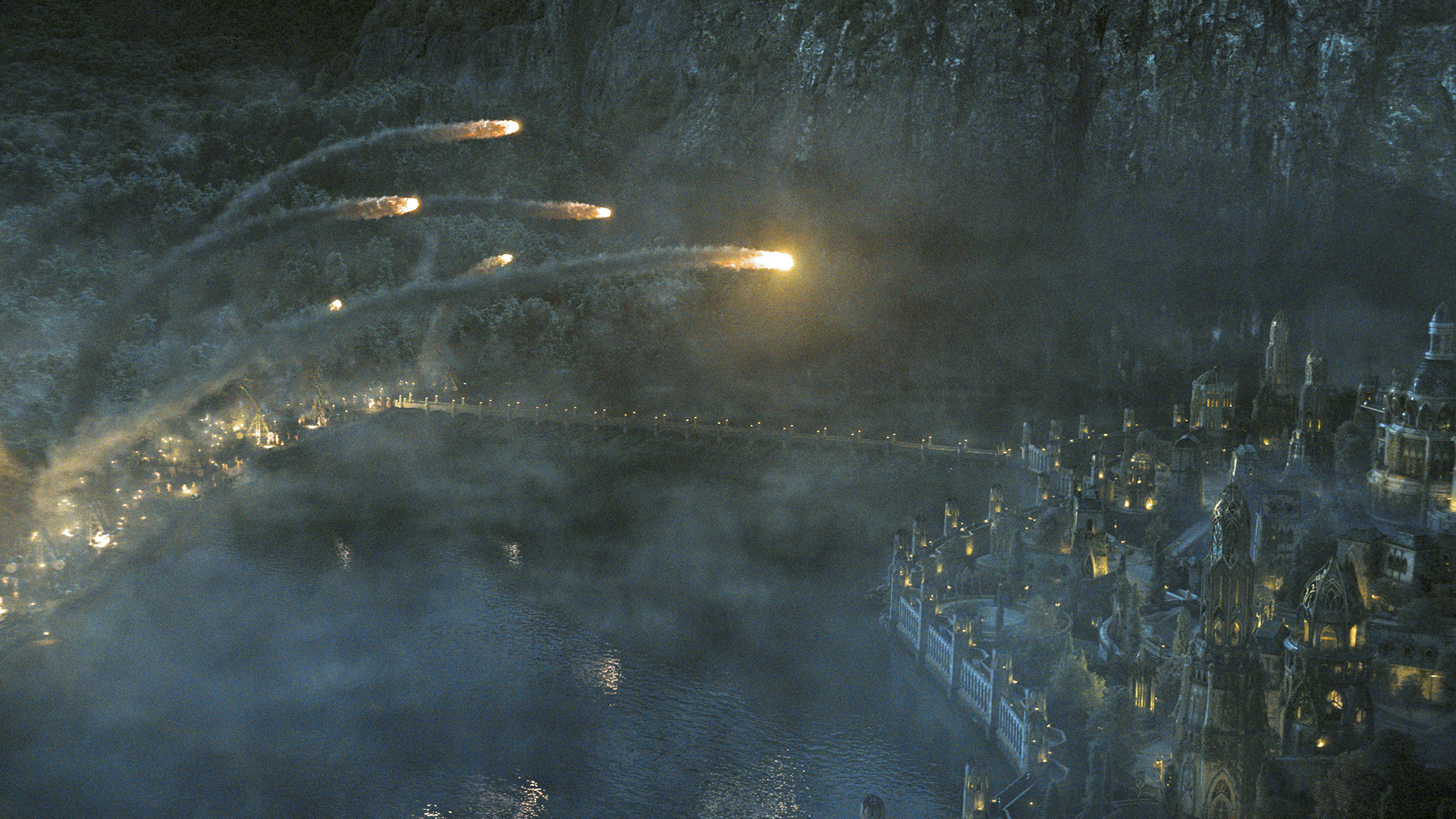 A barrage of fireballs are launched at the city of Eregion in The Rings of Power season 2