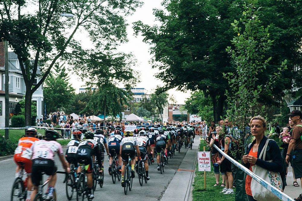 The peloton races through downtown Minneapolis