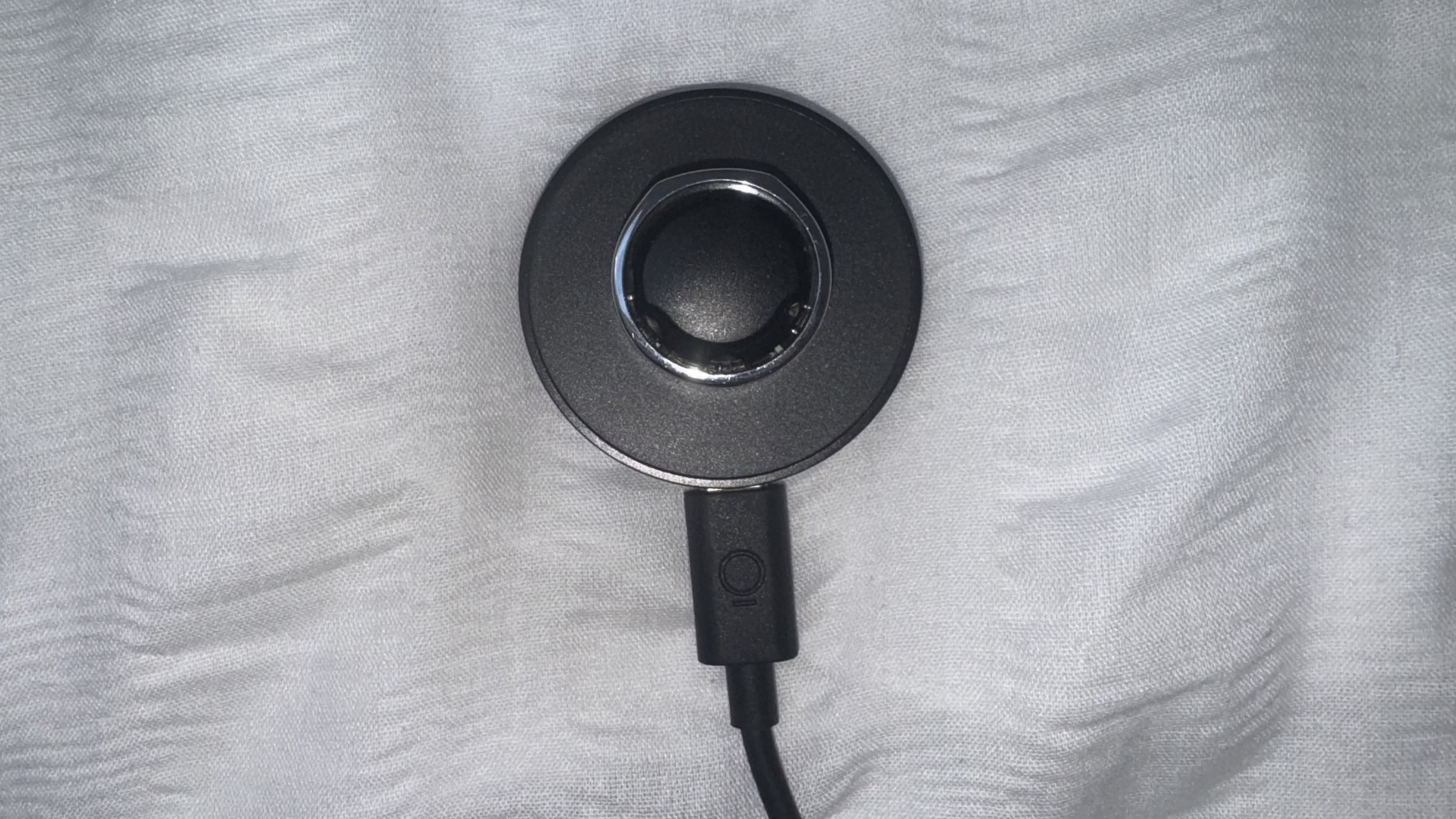 Oura Ring 3 on charging unit