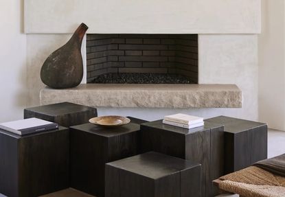 A fireplace in a minimalist setting