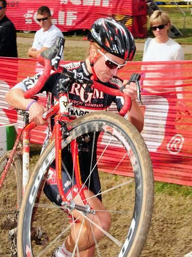 Amy Dombroski (Richard Sachs-RGM Watches) over the barriers.
