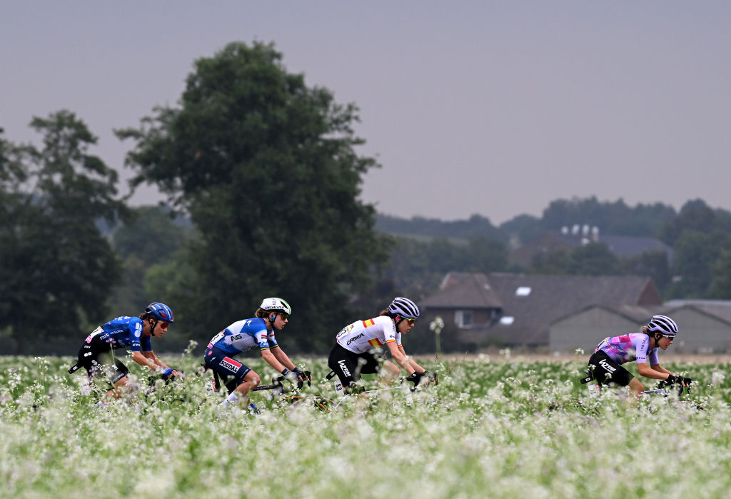 LIEGE, BELGIUM - AUGUST 14: (L-R) Loes Adegeest of The Netherlands and Team FDJ - SUEZ, Sarah Gigante of Australia and AG Insurance - Soudal Team, Usoa Ostolaza of Spain and Team Laboral Kutxa - Fundacion Euskadi and Ane Santesteban of Spain and Team Laboral Kutxa - Fundacion Euskadi compete during the 3rd Tour de France Femmes 2024, Stage 4 a 122.7km stage from Valkenburg to Liege / #UCIWWT / on August 14, 2024 in Liege, Belgium. (Photo by Dario Belingheri/Getty Images)