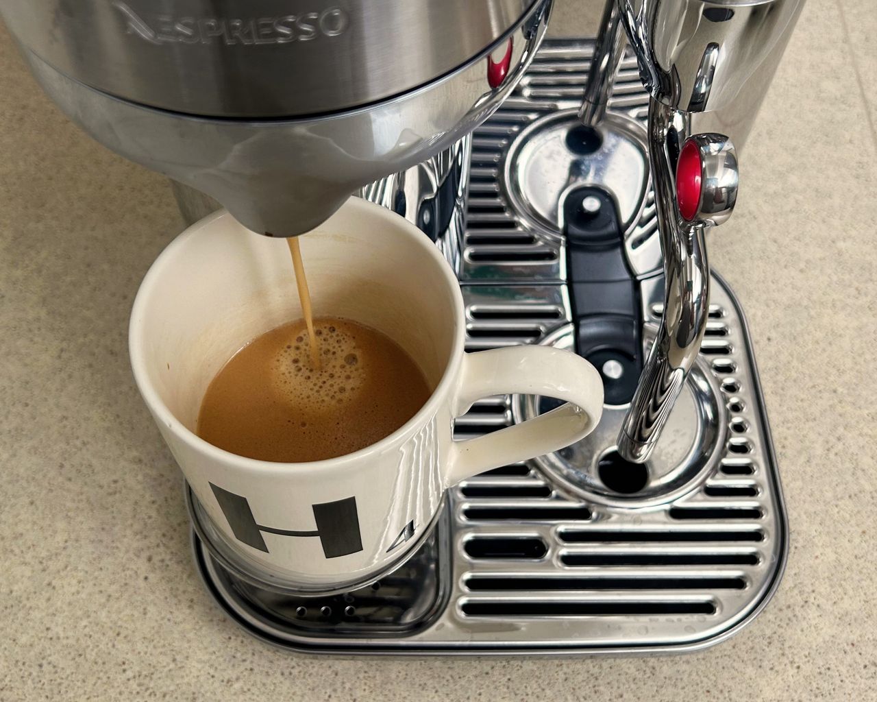 Nespresso Vertuo Creatista pouring coffee