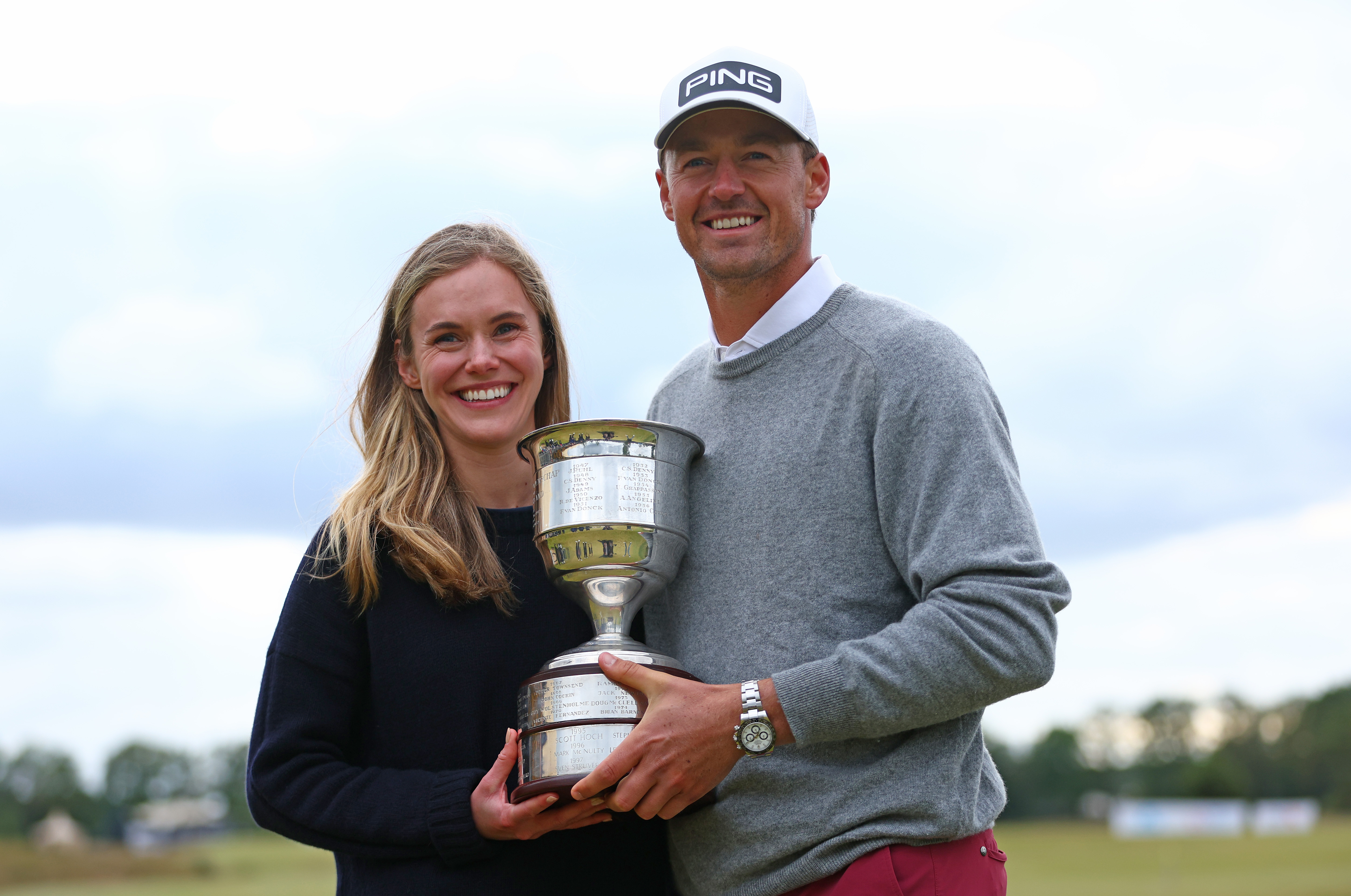 Victor Perez and his wife, Abigail Gliksten hold up the KLM Open trophy in 2022