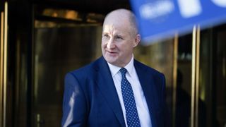 Kevin Hollinrake, Minister of State for Enterprise, Markets and Small Business, photographed leaving an office building
