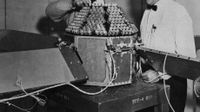 Technicians work on NASA's Beacon Explorer-A before its ill-fated launch.