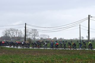 WEVELGEM BELGIUM MARCH 26 A general view of the peloton competing during the 85th GentWevelgem in Flanders Fields 2023 Mens Elite a 2609km one day race from Ypres to Wevelgem UCIWT on March 26 2023 in Wevelgem Belgium Photo by Tim de WaeleGetty Images