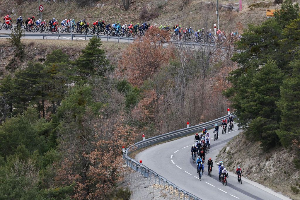 The pack rides during the 6th stage of the Paris-Nice cycling race, 198,5 km between Sisteron and La Colle-sur-Loup, on March 8, 2024. (Photo by Thomas SAMSON / AFP)