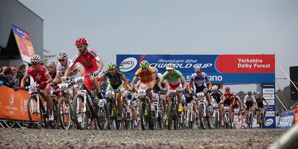 Canada's Geoff Kabush gets the holeshot in the men's race.