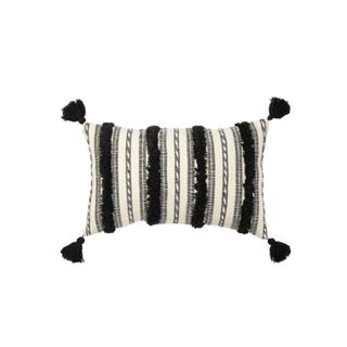 A black and white striped throw pillow