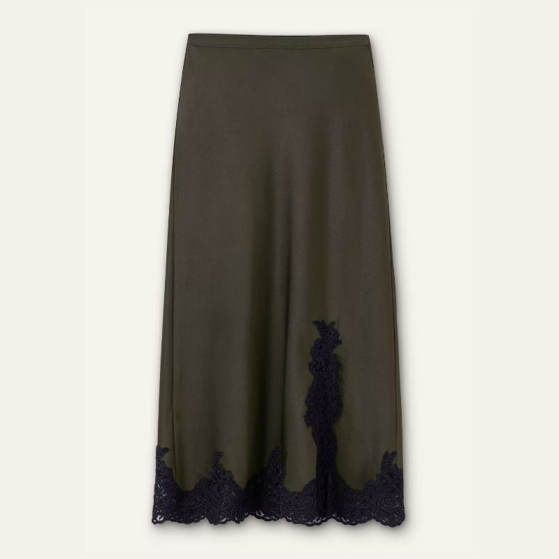 A cutout of an olive green slip skirt edged in lace