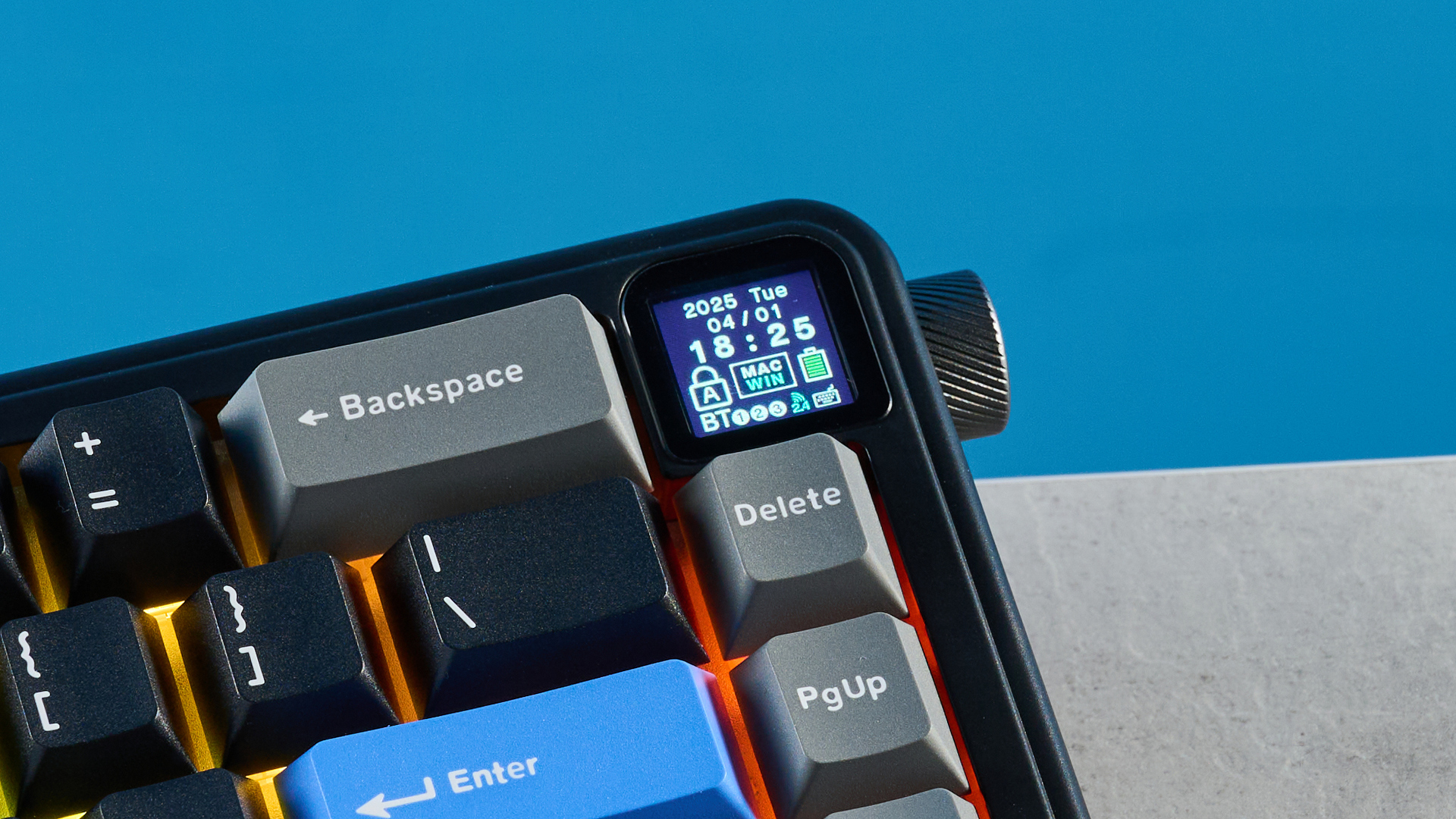A black, gray and blue Epomaker HE65 Mag magnetic keyboard with Hall Effect switches