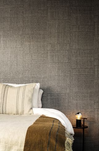 Bedroom with textured wallpaper