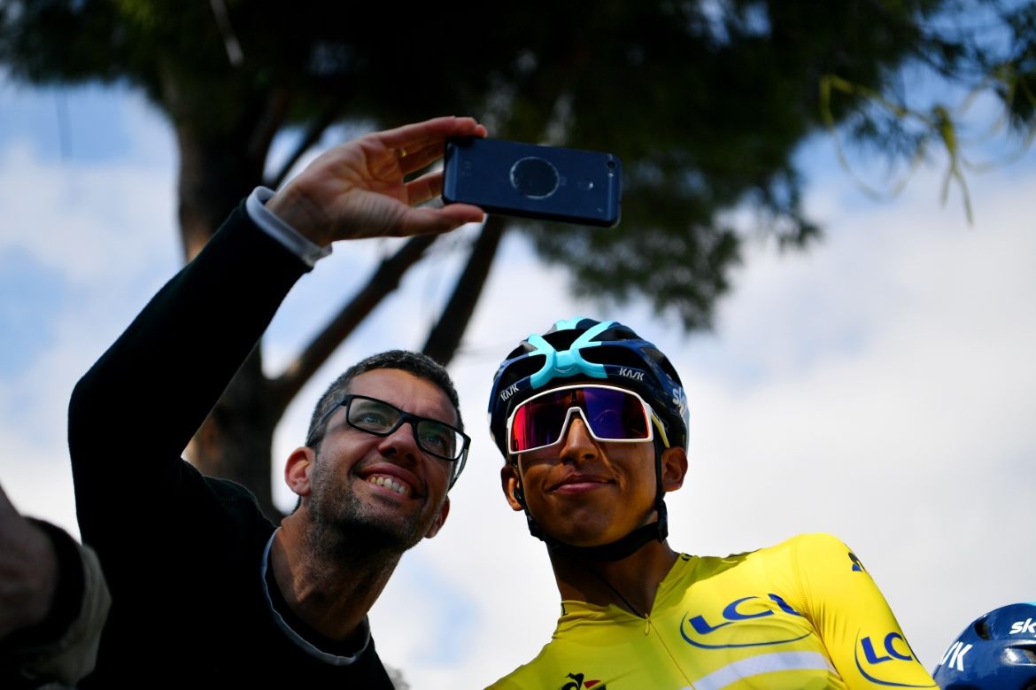 Egan Bernal poses for a photo with a fan