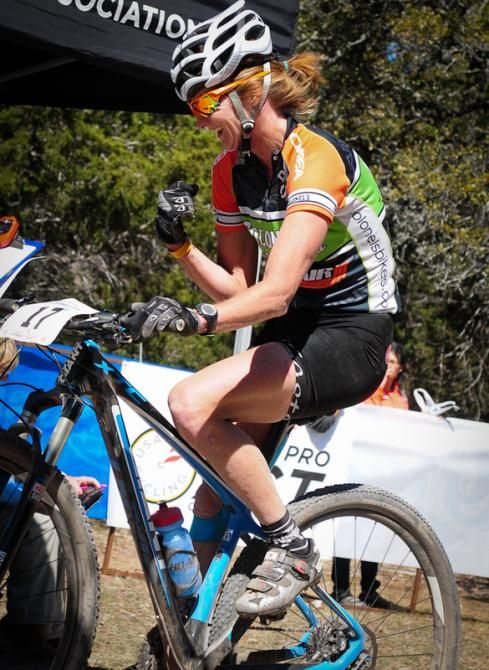 Texas racer Christina Gokey-Smith celebrating a podium finish