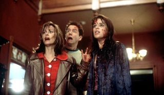 Scream Courtney Cox Jamie Kennedy and Neve Campbell freaked out in a lobby