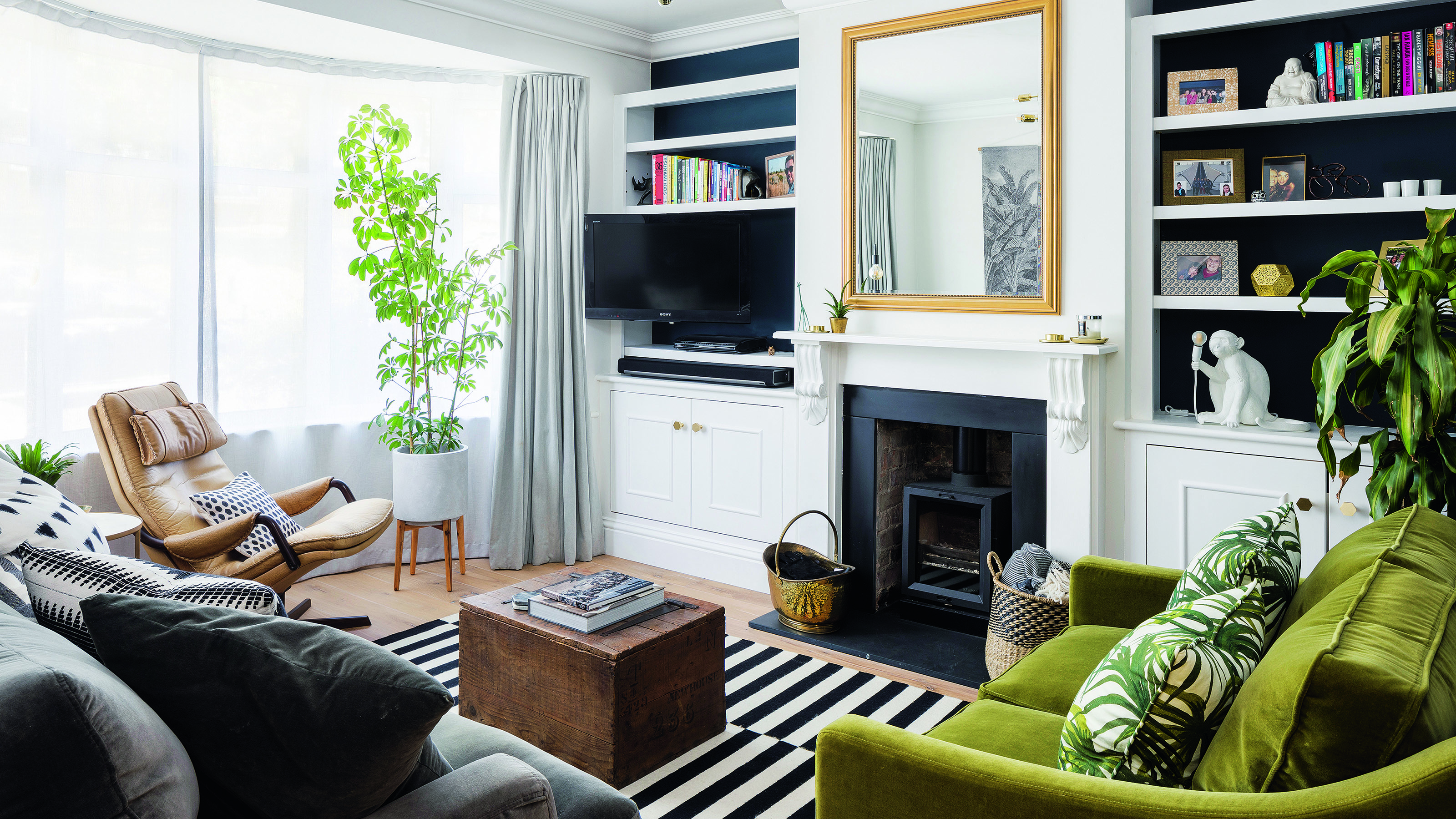 Premium Photo  Stylish composition of living room interior with corner  grey sofa design furniture and minimalist personal accessories book shelf  modern home decor template