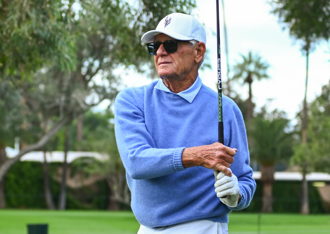 Chuck Schwab holds his finish on a drive