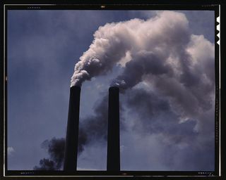 World War II era smokestacks emit pollution, potentially increasing aerosol concentration in the atmosphere.
