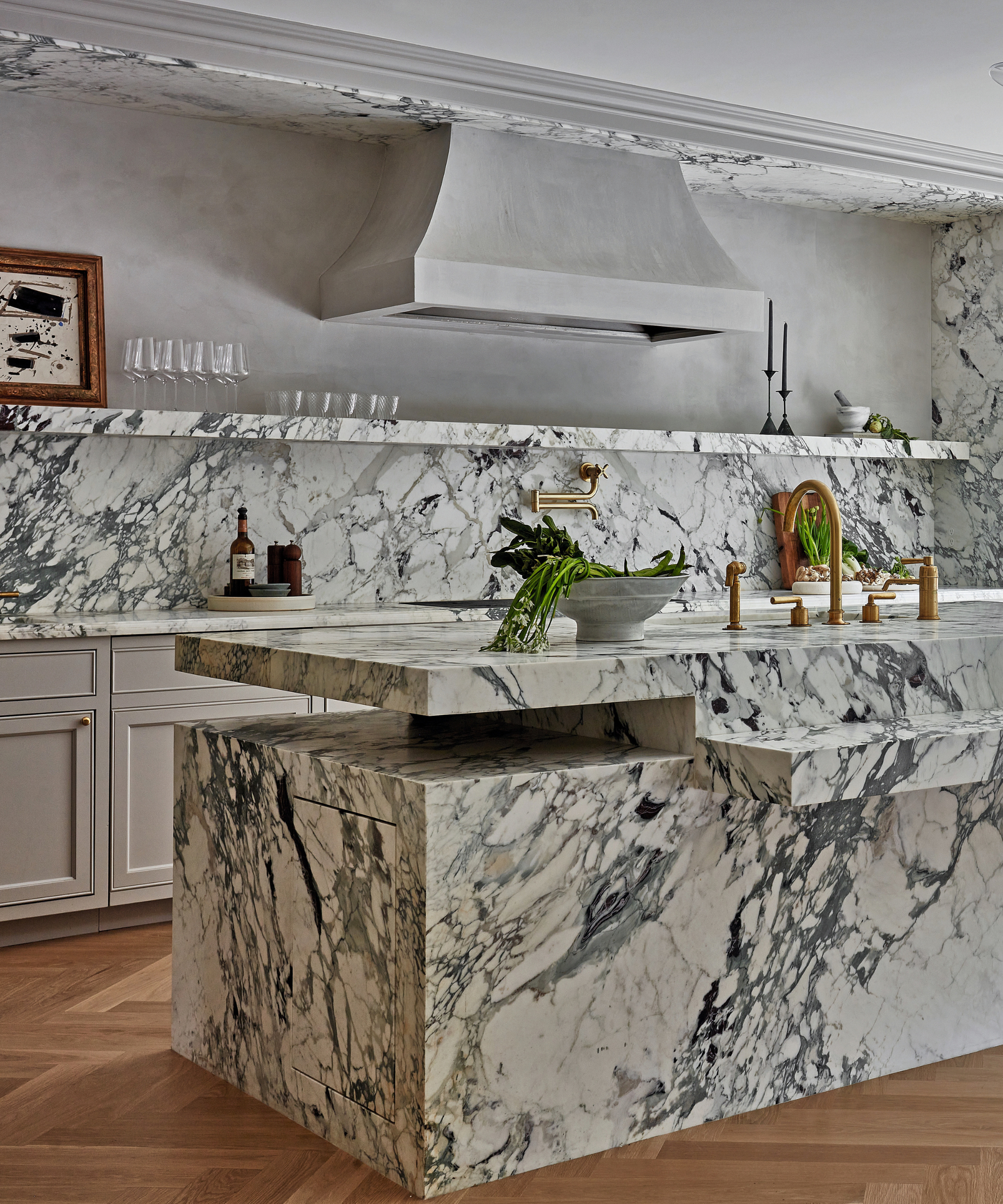 modern kitchen with grey marble cabinets and wooden flooring