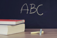 A chalkboard with the letters ABC on it.
