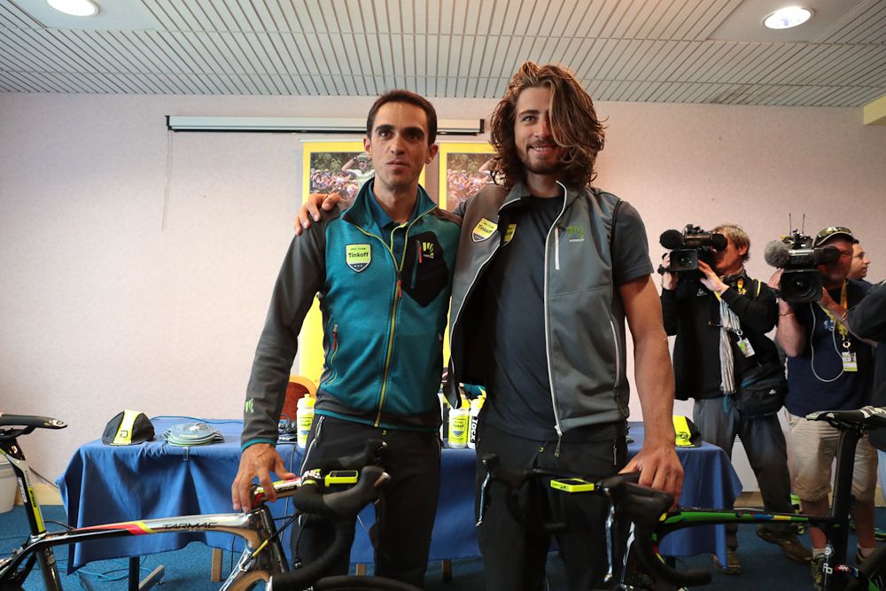 Alberto Contador and Peter sagan pose for photos after the the press conference before the 2016 Tour de France.
