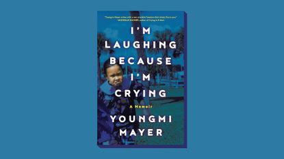 Book cover of &#039;I&#039;m Laughing Because I&#039;m Crying&#039; By Youngmi Mayer