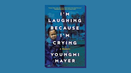 Book cover of 'I'm Laughing Because I'm Crying' By Youngmi Mayer