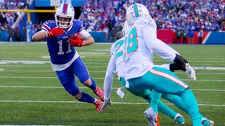 Cole Beasley #11 of the Buffalo Bills scores a touchdown against the Miami Dolphins during the third quarter of the game in the AFC Wild Card playoff game at Highmark Stadium on January 15, 2023 in Orchard Park, New York.
