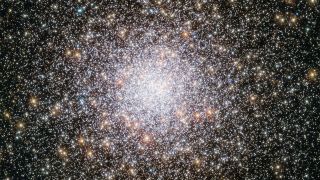 A bright collective of millions of stars, scattered around the edges bu combining to look like one big star at the center