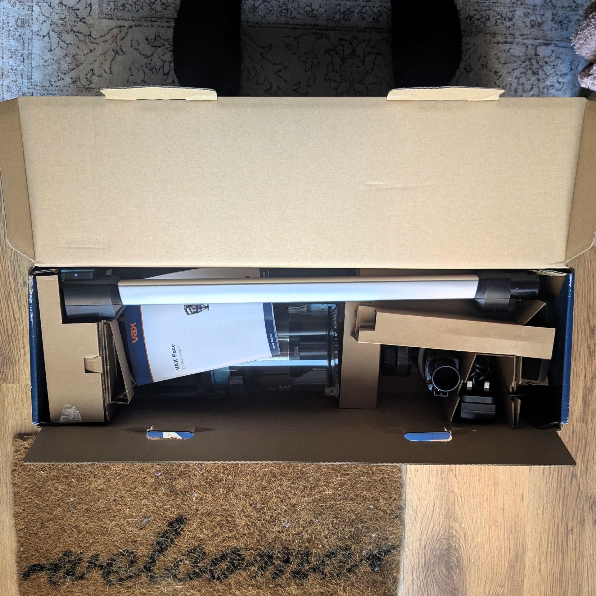 VAX Pace Plus Cordless Vacuum Cleaner in its delivery box