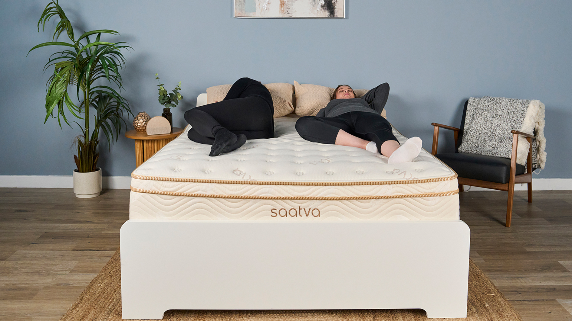Our image shows two of the Tom&#039;s Guide mattress testing team lying on the Saatva Classic in our Sleep Product Testing Lab, during a pressure relief test. It&#039;s easy to see from the image how both testers are kept on top of the mattress instead of sinking in deeply, giving a true reflection of just how good the Saatva Classic mattress is at balancing support and comfort for a wide range of body types