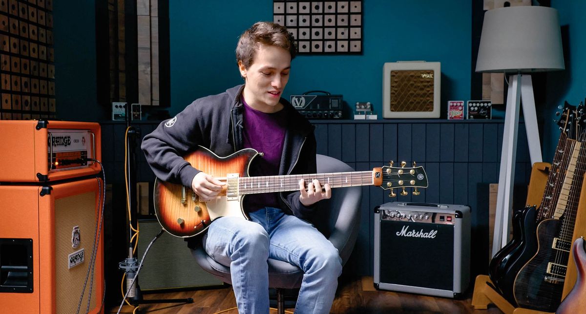 Matteo Mancuso plays his Yamaha Revstar, with a Marshall Jubilee combo in the background