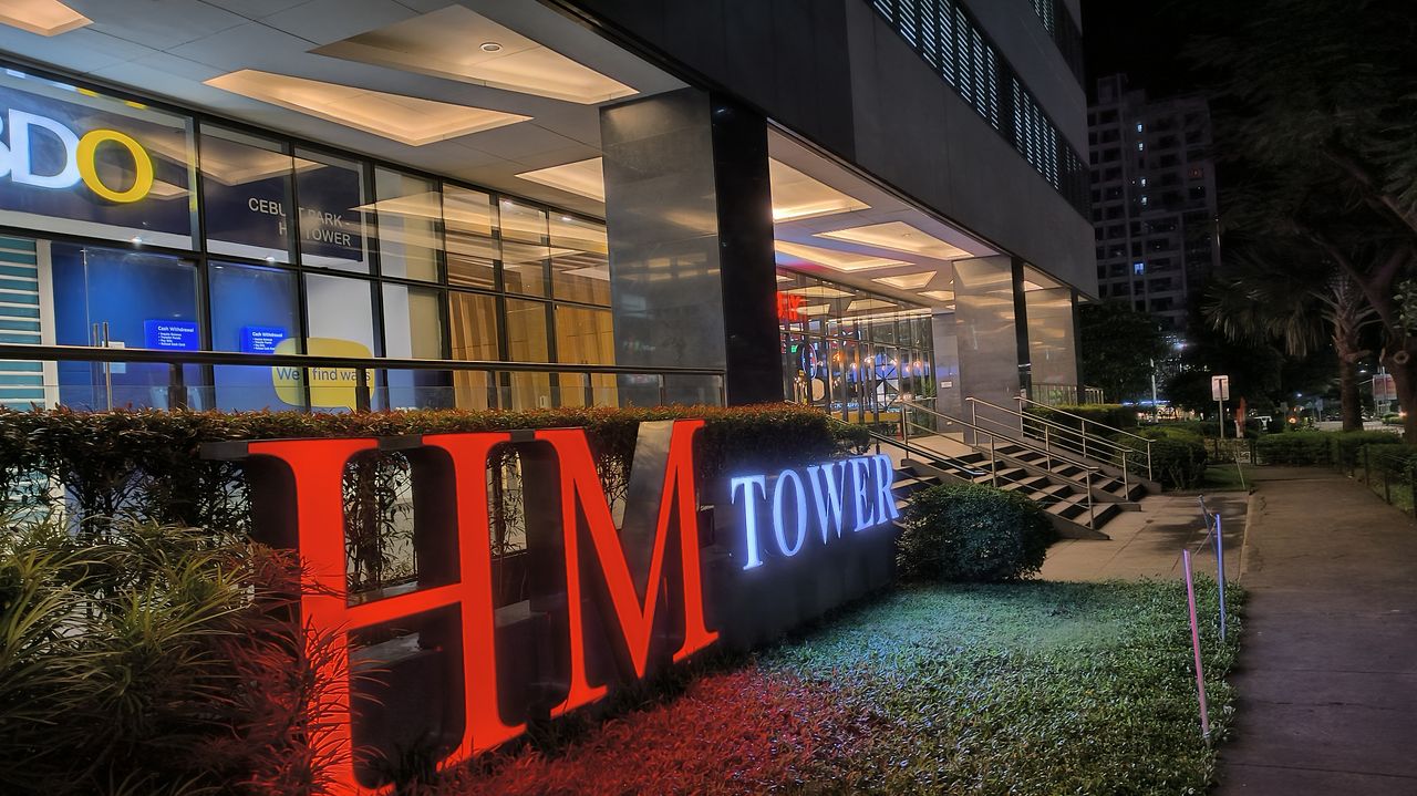 Night shot of a building facade and pavement