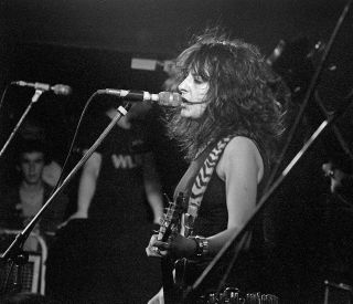 School of rock: Kim McAuliffe on stage in 1983