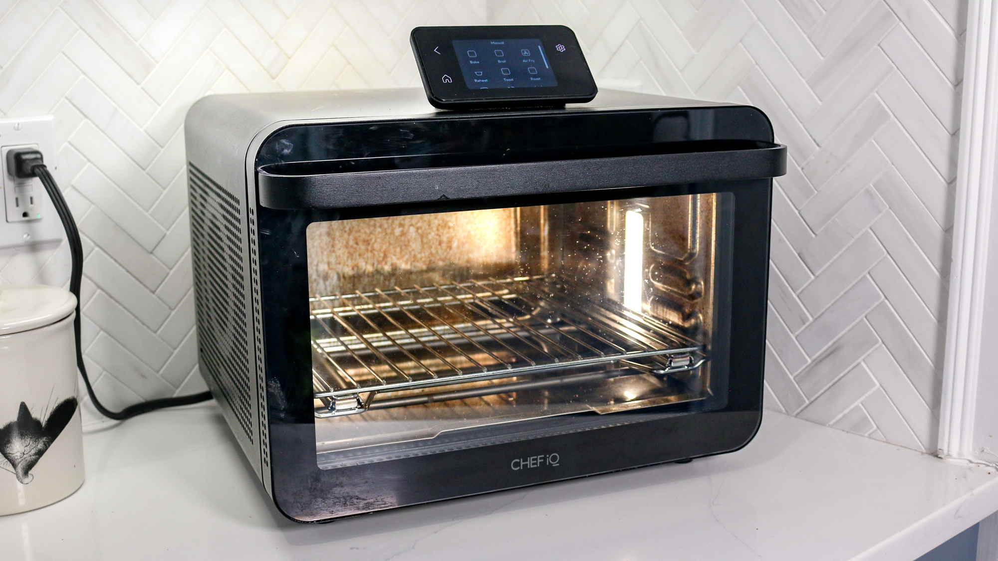 CHEF iQ MiniOven on a kitchen counter