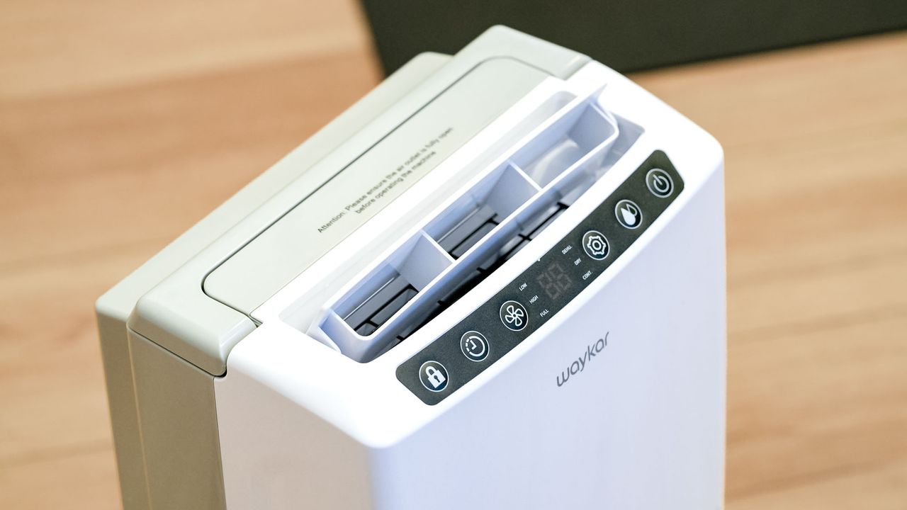 Waykar 34 Pint dehumidifier on floor