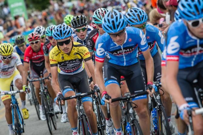 Lachlan Morton (Garmin-Sharp) stays near the front under the safety of his team.