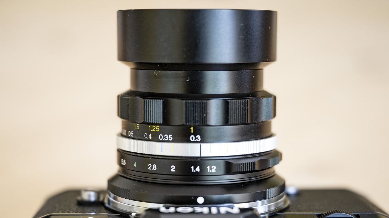 Voigtlander D 35mm f1.2 Nokton lens on a wooden table